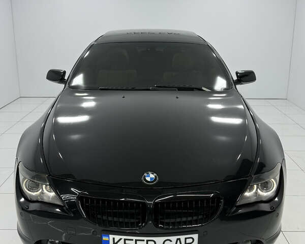 Черный БМВ 6 Серия, объемом двигателя 4.4 л и пробегом 130 тыс. км за 11000 $, фото 4 на Automoto.ua