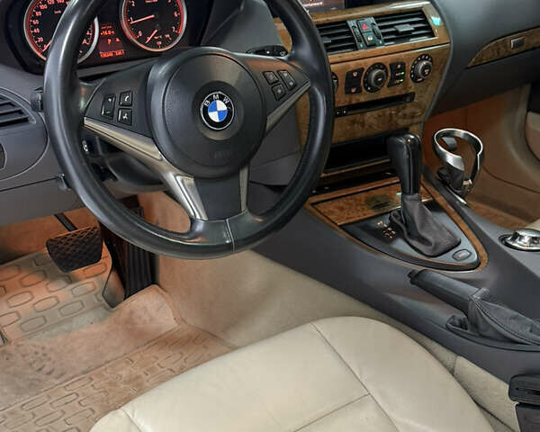Черный БМВ 6 Серия, объемом двигателя 4.4 л и пробегом 130 тыс. км за 11000 $, фото 10 на Automoto.ua