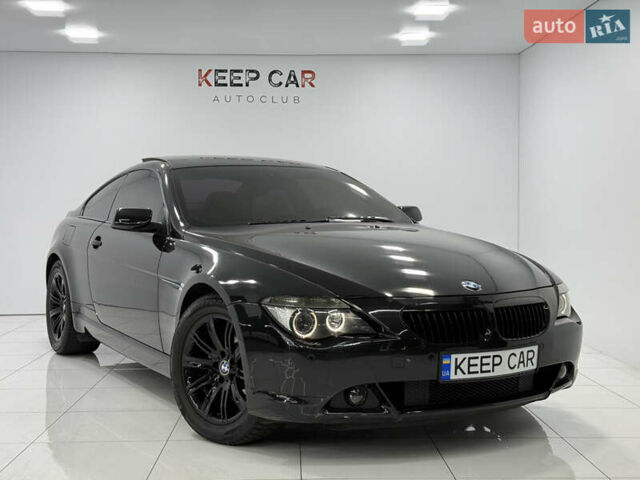Черный БМВ 6 Серия, объемом двигателя 4.4 л и пробегом 130 тыс. км за 11000 $, фото 1 на Automoto.ua