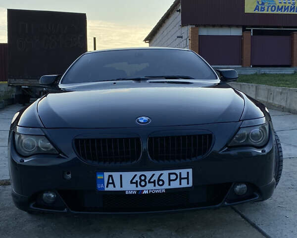 Черный БМВ 6 Серия, объемом двигателя 4.4 л и пробегом 330 тыс. км за 7700 $, фото 8 на Automoto.ua