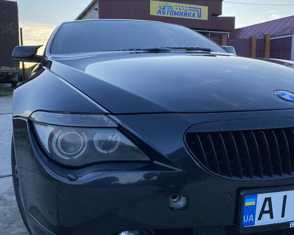 Черный БМВ 6 Серия, объемом двигателя 4.4 л и пробегом 330 тыс. км за 7700 $, фото 15 на Automoto.ua