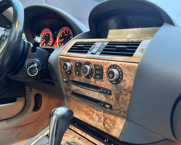 Черный БМВ 6 Серия, объемом двигателя 3 л и пробегом 133 тыс. км за 10500 $, фото 25 на Automoto.ua