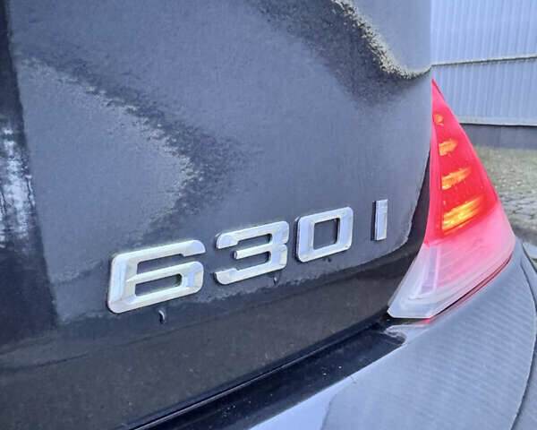 Черный БМВ 6 Серия, объемом двигателя 3 л и пробегом 133 тыс. км за 10500 $, фото 41 на Automoto.ua