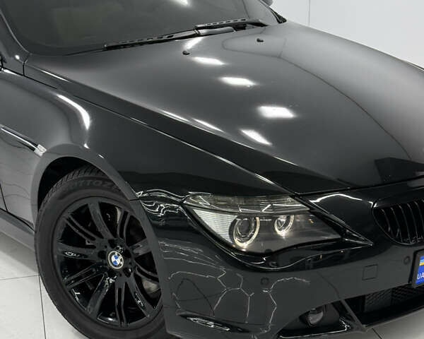 Черный БМВ 6 Серия, объемом двигателя 4.4 л и пробегом 130 тыс. км за 11000 $, фото 2 на Automoto.ua