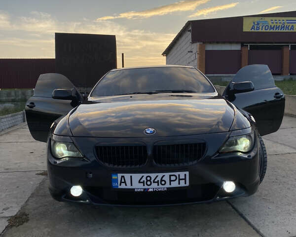 Черный БМВ 6 Серия, объемом двигателя 4.4 л и пробегом 330 тыс. км за 7700 $, фото 4 на Automoto.ua