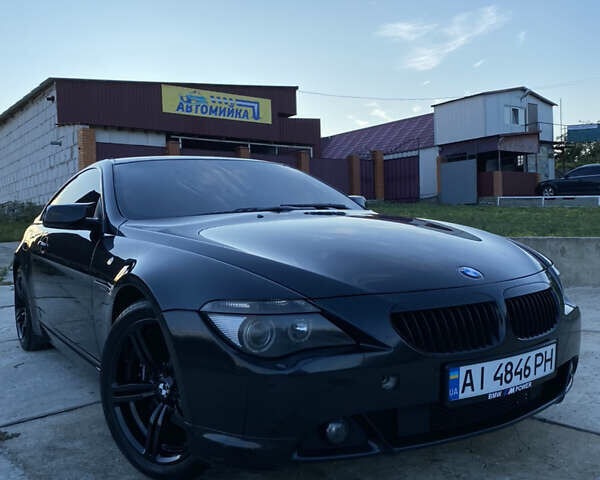 Черный БМВ 6 Серия, объемом двигателя 4.4 л и пробегом 330 тыс. км за 7700 $, фото 16 на Automoto.ua
