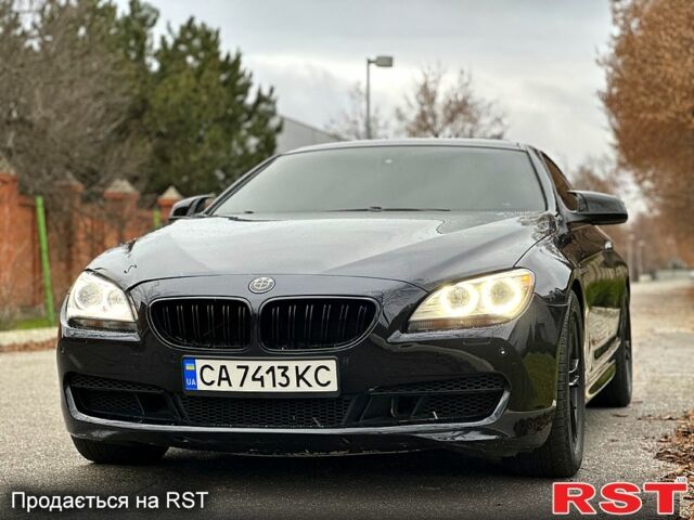 Черный БМВ 6 Серия, объемом двигателя 3 л и пробегом 220 тыс. км за 16300 $, фото 1 на Automoto.ua