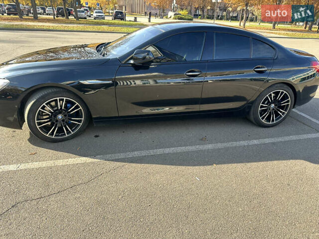 Черный БМВ 6 Серия, объемом двигателя 2.98 л и пробегом 170 тыс. км за 17000 $, фото 2 на Automoto.ua