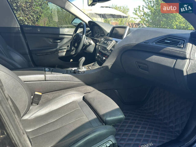 Черный БМВ 6 Серия, объемом двигателя 2.98 л и пробегом 170 тыс. км за 17000 $, фото 13 на Automoto.ua