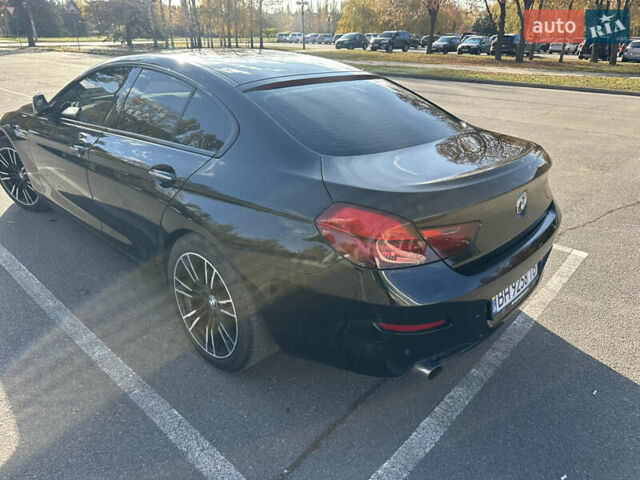 Черный БМВ 6 Серия, объемом двигателя 2.98 л и пробегом 170 тыс. км за 17000 $, фото 5 на Automoto.ua