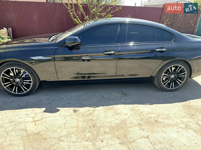 Черный БМВ 6 Серия, объемом двигателя 2.98 л и пробегом 170 тыс. км за 17000 $, фото 9 на Automoto.ua