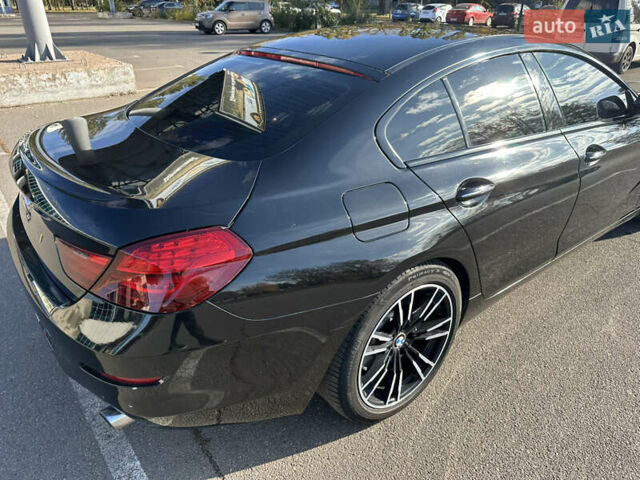 Черный БМВ 6 Серия, объемом двигателя 2.98 л и пробегом 170 тыс. км за 17000 $, фото 7 на Automoto.ua