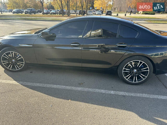 Черный БМВ 6 Серия, объемом двигателя 2.98 л и пробегом 170 тыс. км за 17000 $, фото 3 на Automoto.ua