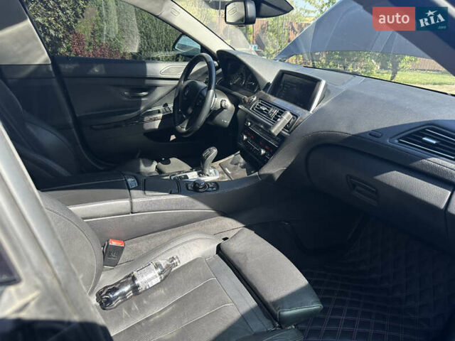 Черный БМВ 6 Серия, объемом двигателя 2.98 л и пробегом 170 тыс. км за 17000 $, фото 11 на Automoto.ua