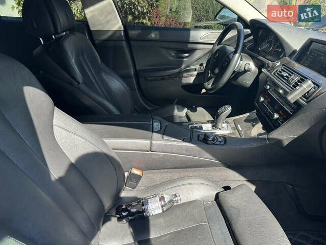 Черный БМВ 6 Серия, объемом двигателя 2.98 л и пробегом 170 тыс. км за 17000 $, фото 12 на Automoto.ua