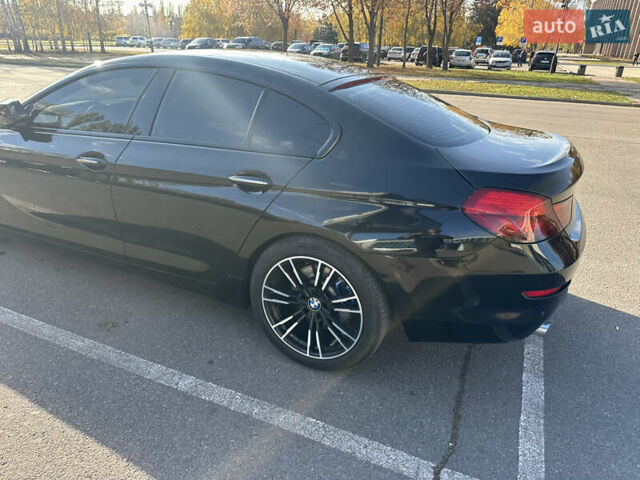 Черный БМВ 6 Серия, объемом двигателя 2.98 л и пробегом 170 тыс. км за 17000 $, фото 4 на Automoto.ua