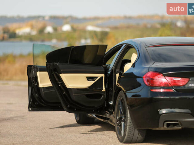 Черный БМВ 6 Серия, объемом двигателя 4.39 л и пробегом 120 тыс. км за 22500 $, фото 13 на Automoto.ua