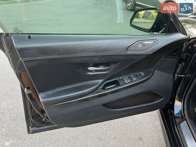 Черный БМВ 6 Серия, объемом двигателя 4.4 л и пробегом 147 тыс. км за 29500 $, фото 20 на Automoto.ua
