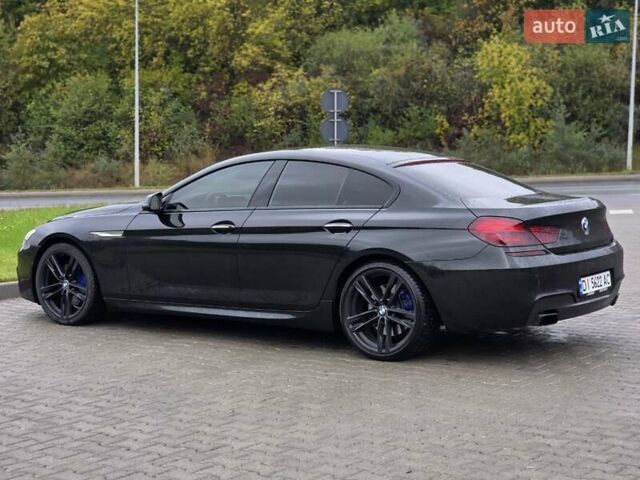 Черный БМВ 6 Серия, объемом двигателя 4.4 л и пробегом 147 тыс. км за 27999 $, фото 4 на Automoto.ua