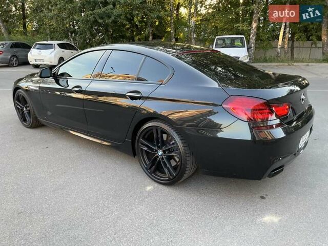 Черный БМВ 6 Серия, объемом двигателя 4.4 л и пробегом 147 тыс. км за 29500 $, фото 23 на Automoto.ua