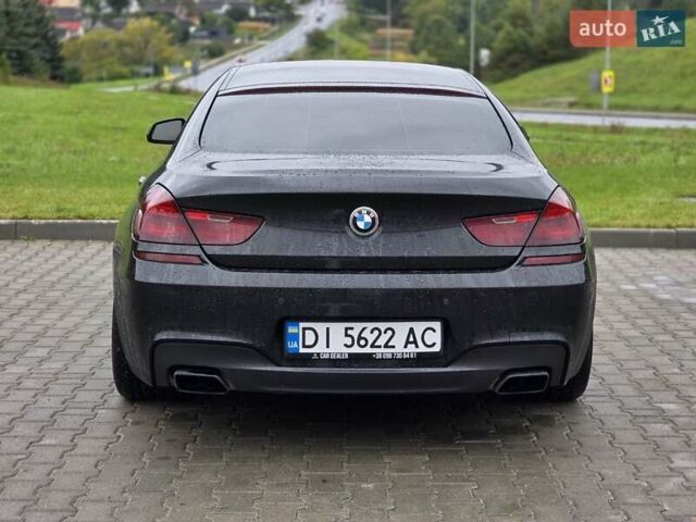 Черный БМВ 6 Серия, объемом двигателя 4.4 л и пробегом 147 тыс. км за 27999 $, фото 1 на Automoto.ua