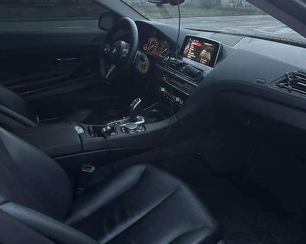 Черный БМВ 6 Серия, объемом двигателя 2.98 л и пробегом 170 тыс. км за 25000 $, фото 13 на Automoto.ua