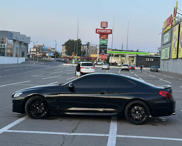 Черный БМВ 6 Серия, объемом двигателя 2.98 л и пробегом 170 тыс. км за 25000 $, фото 5 на Automoto.ua
