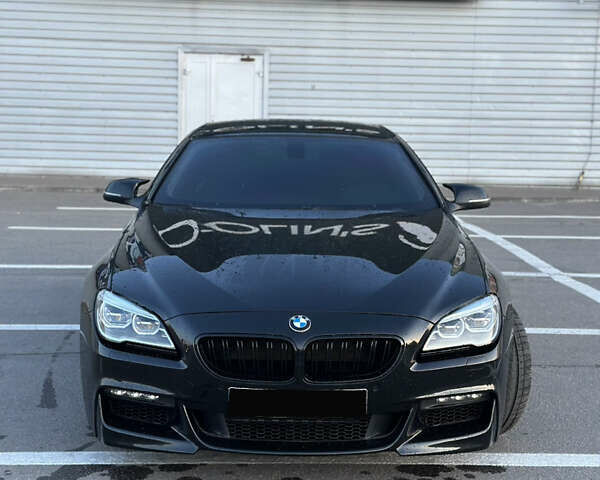 Черный БМВ 6 Серия, объемом двигателя 2.98 л и пробегом 170 тыс. км за 25000 $, фото 2 на Automoto.ua