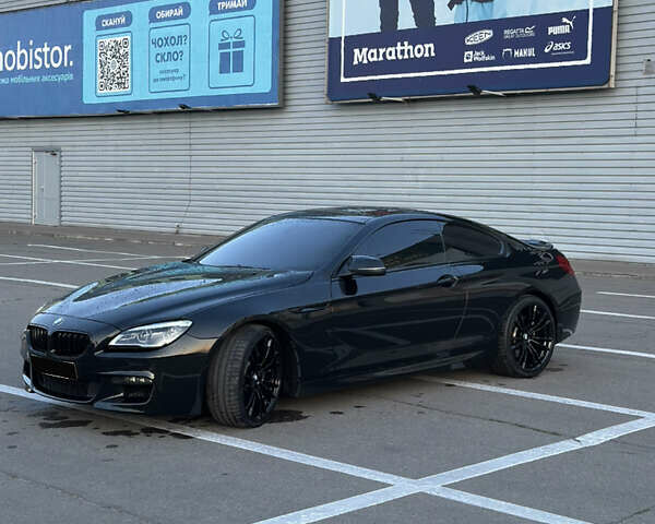 Черный БМВ 6 Серия, объемом двигателя 2.98 л и пробегом 170 тыс. км за 25000 $, фото 4 на Automoto.ua