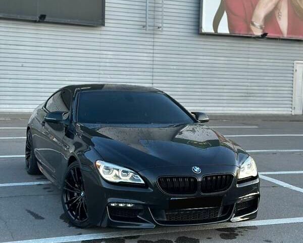 Черный БМВ 6 Серия, объемом двигателя 2.98 л и пробегом 170 тыс. км за 25000 $, фото 1 на Automoto.ua