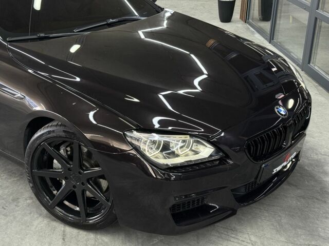 Черный БМВ 6 Серия, объемом двигателя 4.4 л и пробегом 53 тыс. км за 24000 $, фото 1 на Automoto.ua