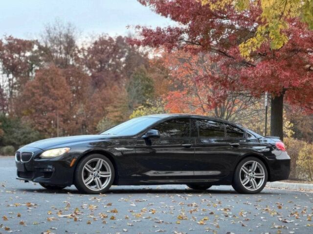 Черный БМВ 6 Серия, объемом двигателя 3 л и пробегом 73 тыс. км за 15100 $, фото 3 на Automoto.ua