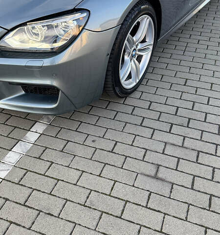 Серый БМВ 6 Серия, объемом двигателя 3 л и пробегом 115 тыс. км за 18000 $, фото 10 на Automoto.ua