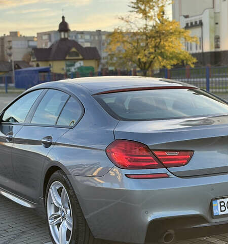 Серый БМВ 6 Серия, объемом двигателя 3 л и пробегом 115 тыс. км за 18000 $, фото 4 на Automoto.ua