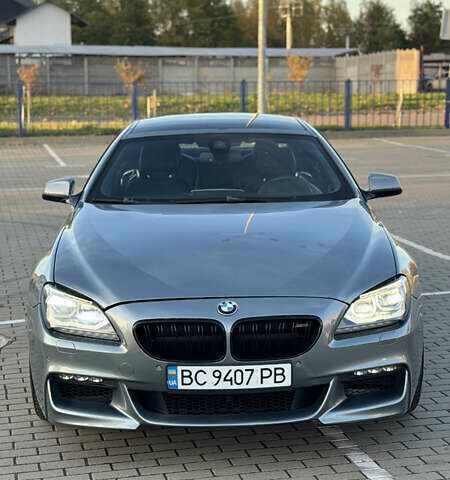 Серый БМВ 6 Серия, объемом двигателя 3 л и пробегом 115 тыс. км за 18000 $, фото 2 на Automoto.ua