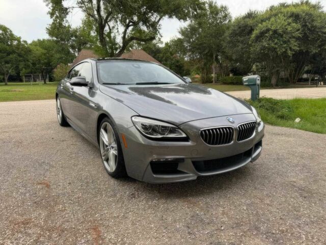 Серый БМВ 6 Серия, объемом двигателя 3 л и пробегом 73 тыс. км за 7000 $, фото 2 на Automoto.ua