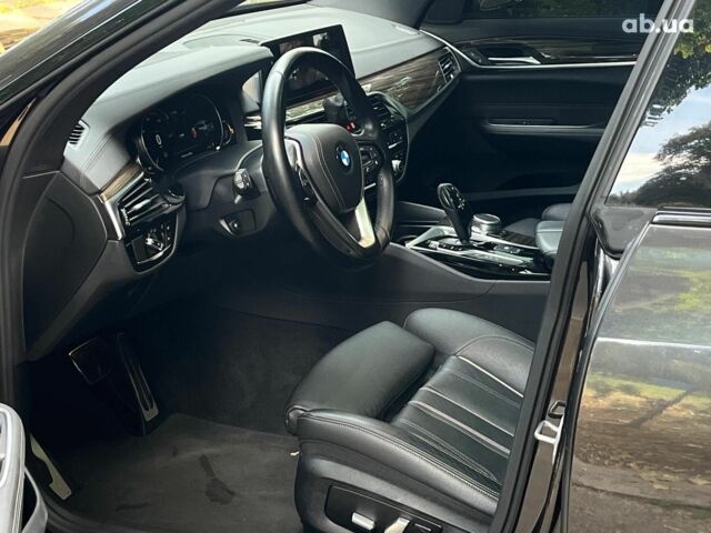 Серый БМВ 6 Серия, объемом двигателя 3 л и пробегом 75 тыс. км за 33990 $, фото 20 на Automoto.ua