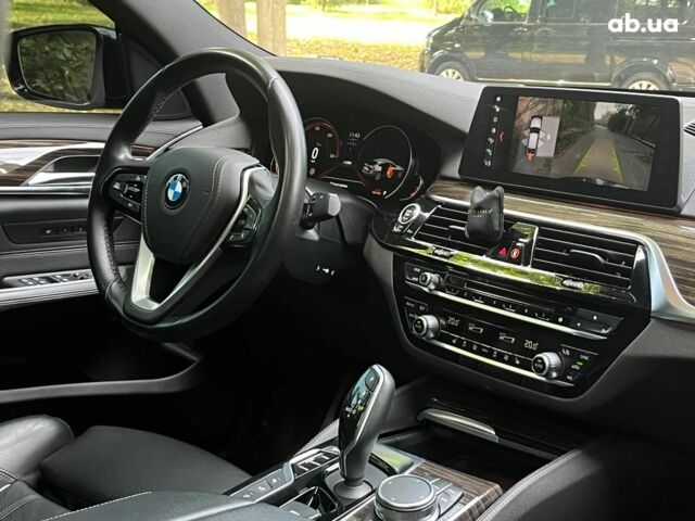 Серый БМВ 6 Серия, объемом двигателя 3 л и пробегом 75 тыс. км за 33990 $, фото 44 на Automoto.ua