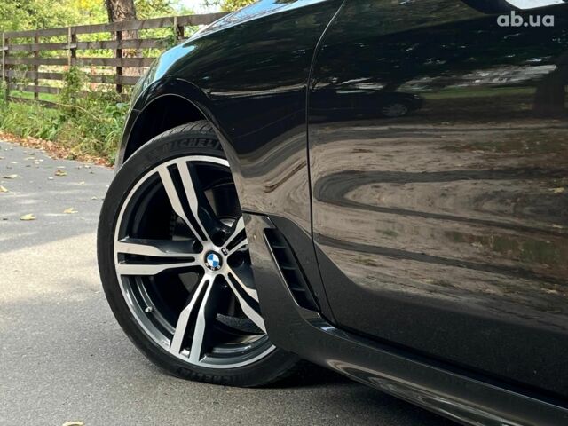 Серый БМВ 6 Серия, объемом двигателя 3 л и пробегом 75 тыс. км за 33990 $, фото 7 на Automoto.ua