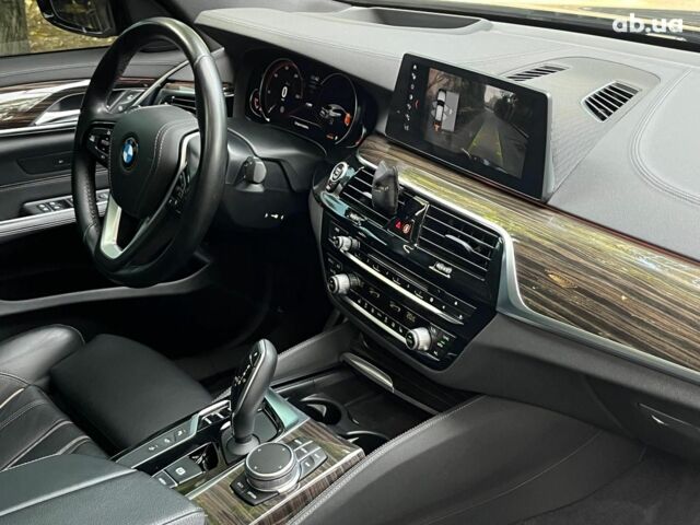 Серый БМВ 6 Серия, объемом двигателя 3 л и пробегом 75 тыс. км за 33990 $, фото 40 на Automoto.ua