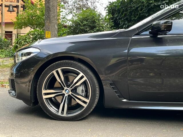 Серый БМВ 6 Серия, объемом двигателя 3 л и пробегом 75 тыс. км за 33990 $, фото 5 на Automoto.ua