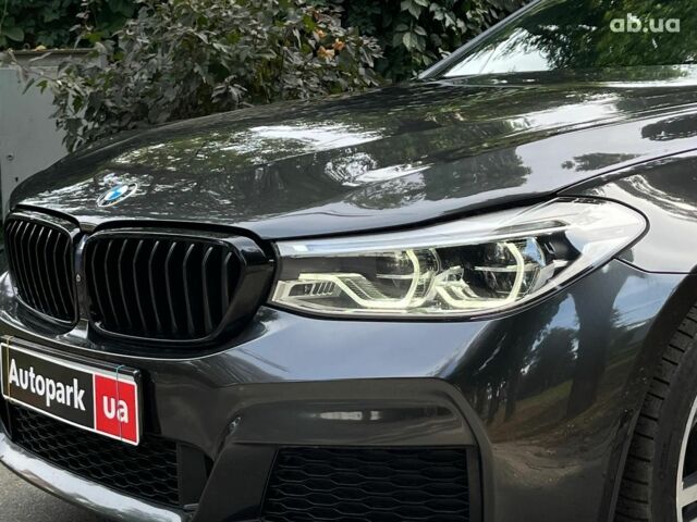 Серый БМВ 6 Серия, объемом двигателя 3 л и пробегом 75 тыс. км за 33990 $, фото 4 на Automoto.ua
