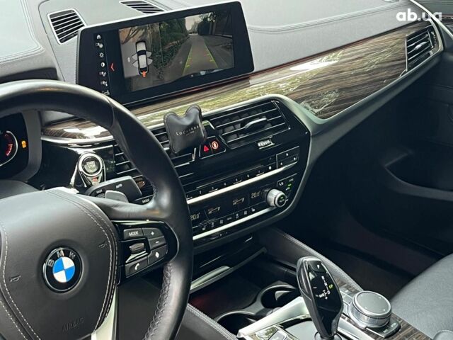 Серый БМВ 6 Серия, объемом двигателя 3 л и пробегом 75 тыс. км за 33990 $, фото 28 на Automoto.ua