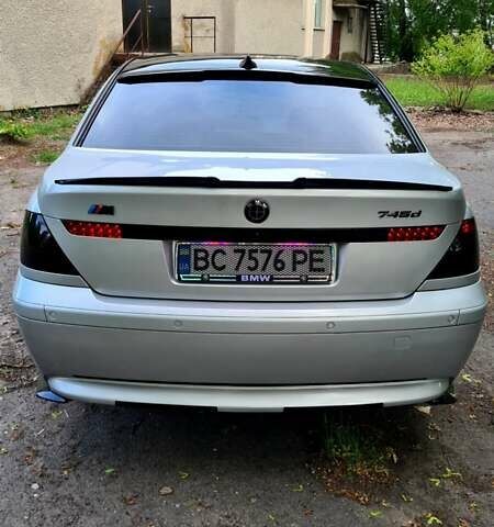 Белый БМВ 7 Серия, объемом двигателя 2.99 л и пробегом 330 тыс. км за 9700 $, фото 2 на Automoto.ua