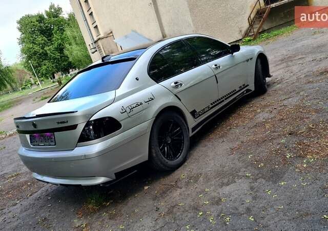 Белый БМВ 7 Серия, объемом двигателя 2.99 л и пробегом 330 тыс. км за 9700 $, фото 5 на Automoto.ua