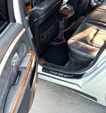 Белый БМВ 7 Серия, объемом двигателя 2.99 л и пробегом 330 тыс. км за 9700 $, фото 19 на Automoto.ua