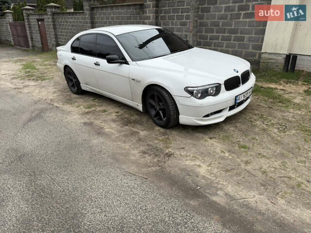 Белый БМВ 7 Серия, объемом двигателя 5.97 л и пробегом 160 тыс. км за 14999 $, фото 1 на Automoto.ua