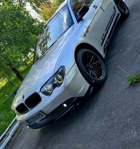 Белый БМВ 7 Серия, объемом двигателя 2.99 л и пробегом 330 тыс. км за 9700 $, фото 7 на Automoto.ua