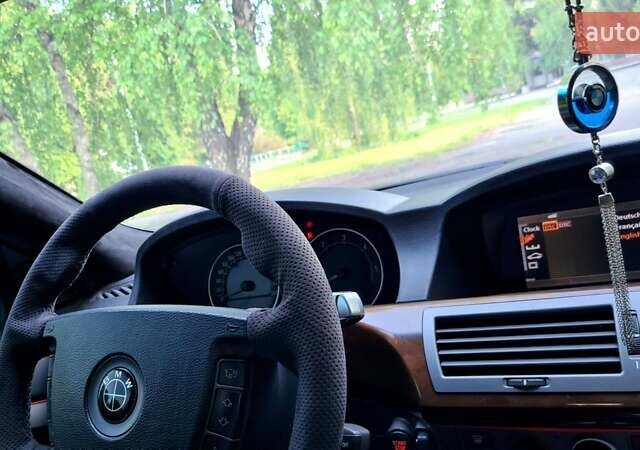 Белый БМВ 7 Серия, объемом двигателя 2.99 л и пробегом 330 тыс. км за 9700 $, фото 24 на Automoto.ua