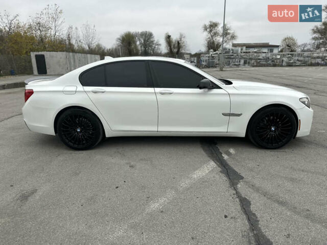 Белый БМВ 7 Серия, объемом двигателя 3 л и пробегом 291 тыс. км за 17500 $, фото 5 на Automoto.ua